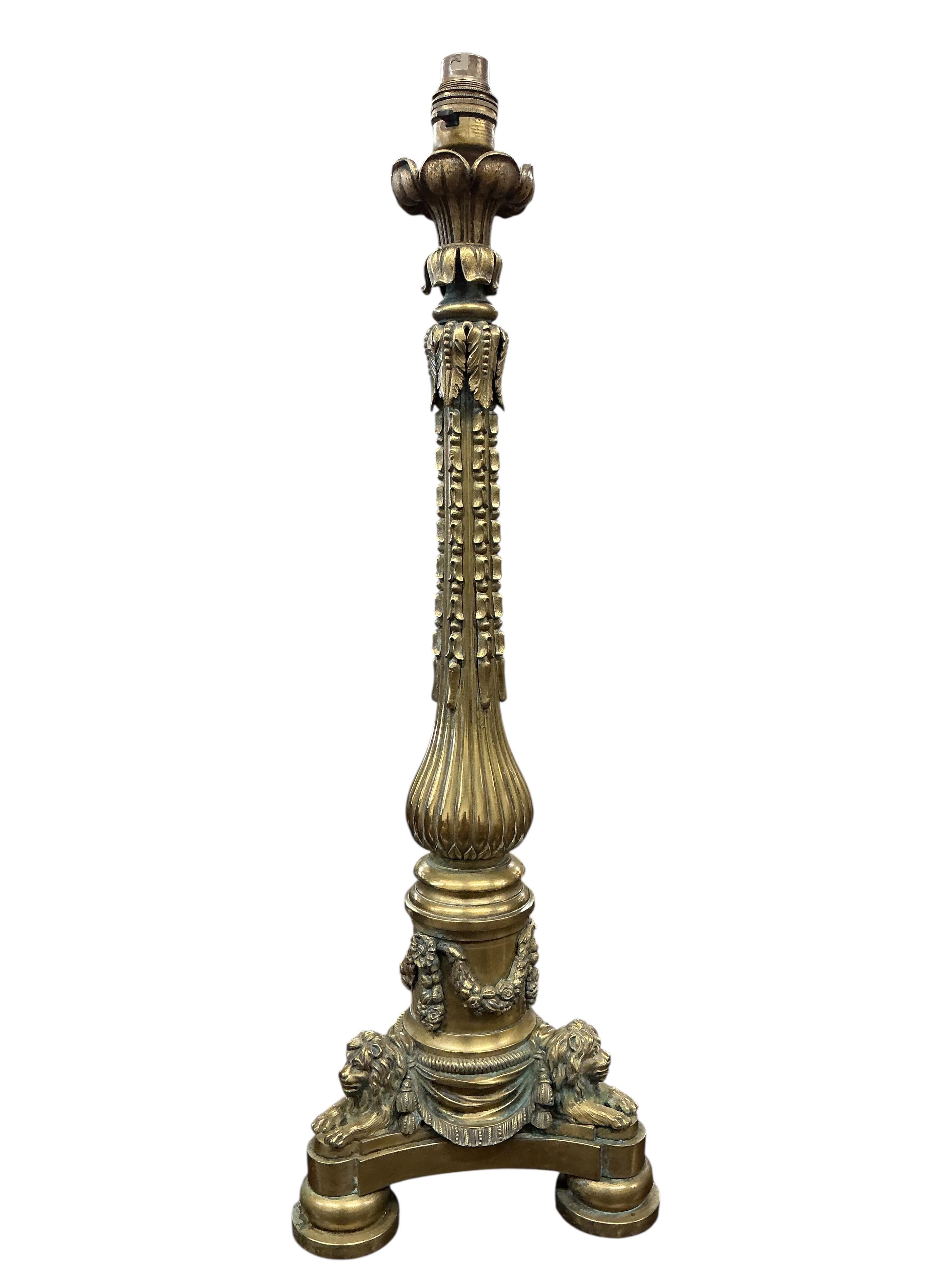 An early 20th century brass Corinthian column table lamp, height 56cm together with a larger Regency style table lamp